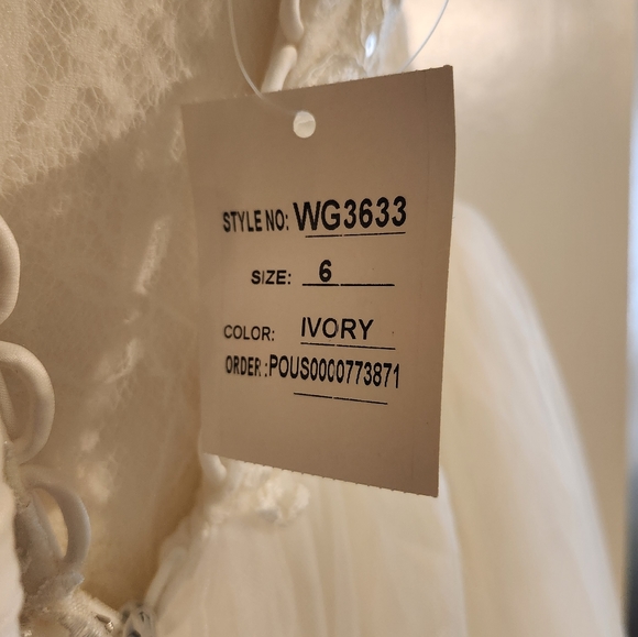 David's Bridal Ivory Strapless Corset dress - Picture 7 of 10